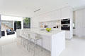 amazing white quartz kitchen