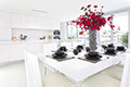 white kitchen with red roses